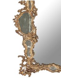 An Italian Silvered Wood and Etched Glass Mirror