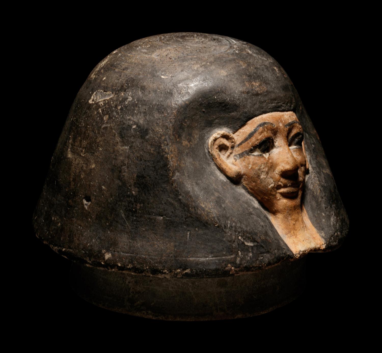 An Egyptian Canopic Jar Lid