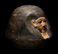 An Egyptian Canopic Jar Lid