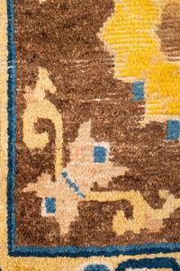 A Framed Chinese Wool Rug