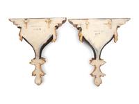 A Pair of Italian Parcel Gilt and Ebonized Wall Brackets