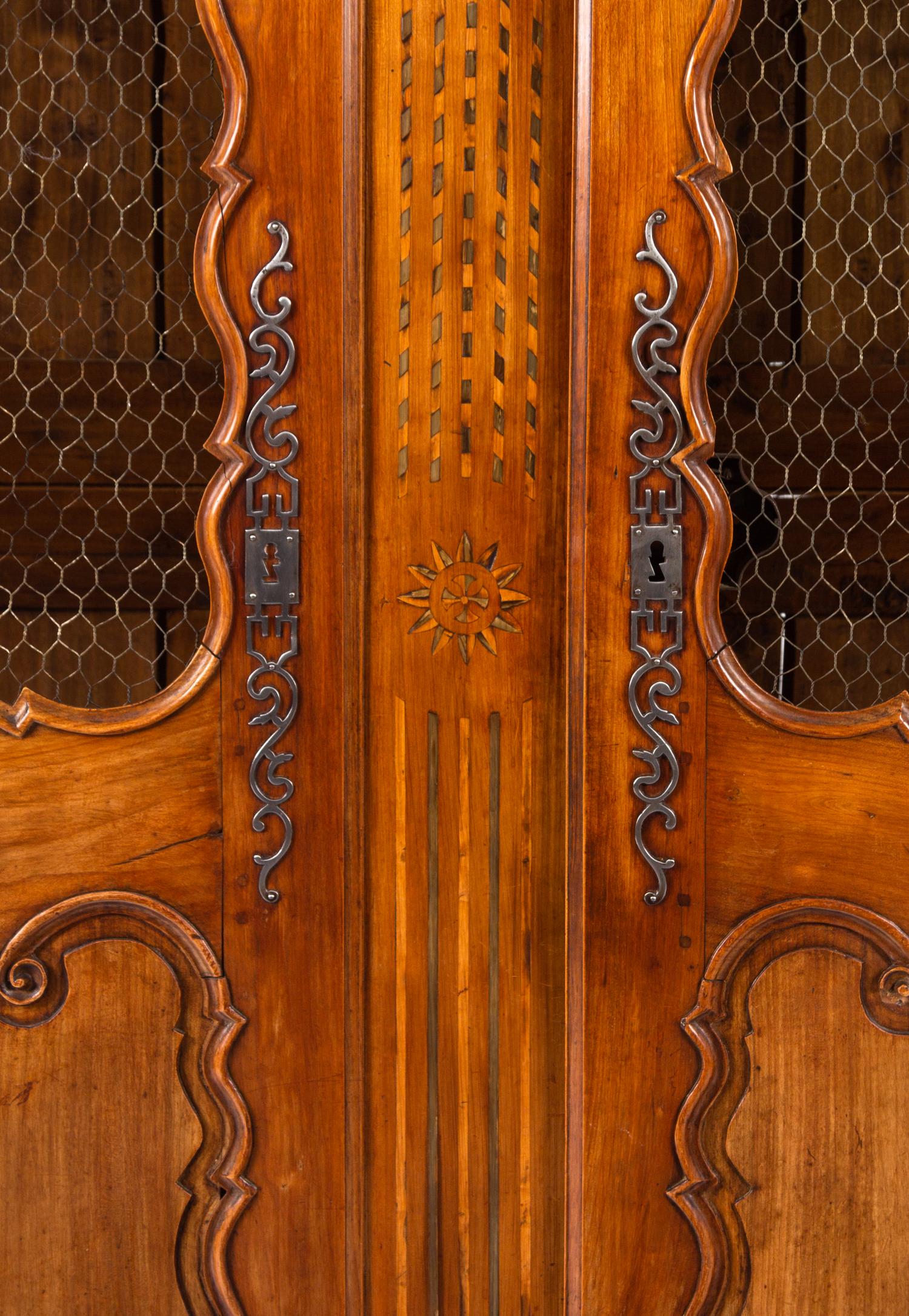 A French Provincial Walnut Armoire