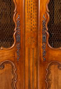 A French Provincial Walnut Armoire