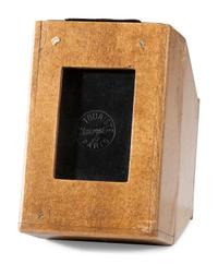 [EARLY PHOTOGRAPHY]. Truncated polished wood box camera. Le Touriste, Paris.