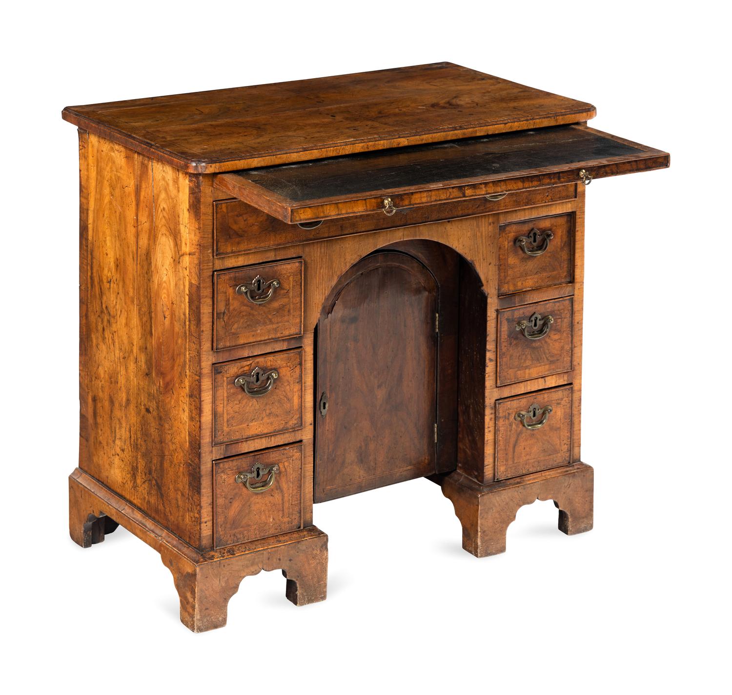 A George I Walnut Kneehole Desk