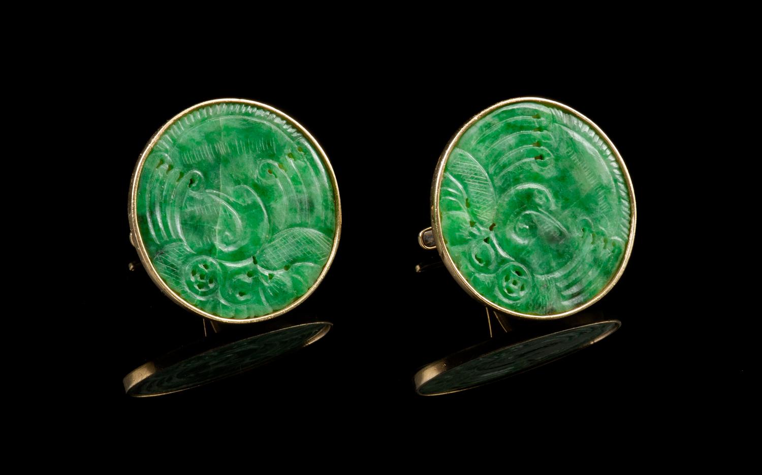 A Pair of Chinese 14 Karat Gold and Jadeite Cufflinks Diameter of jadeite 1 1/8 inches.