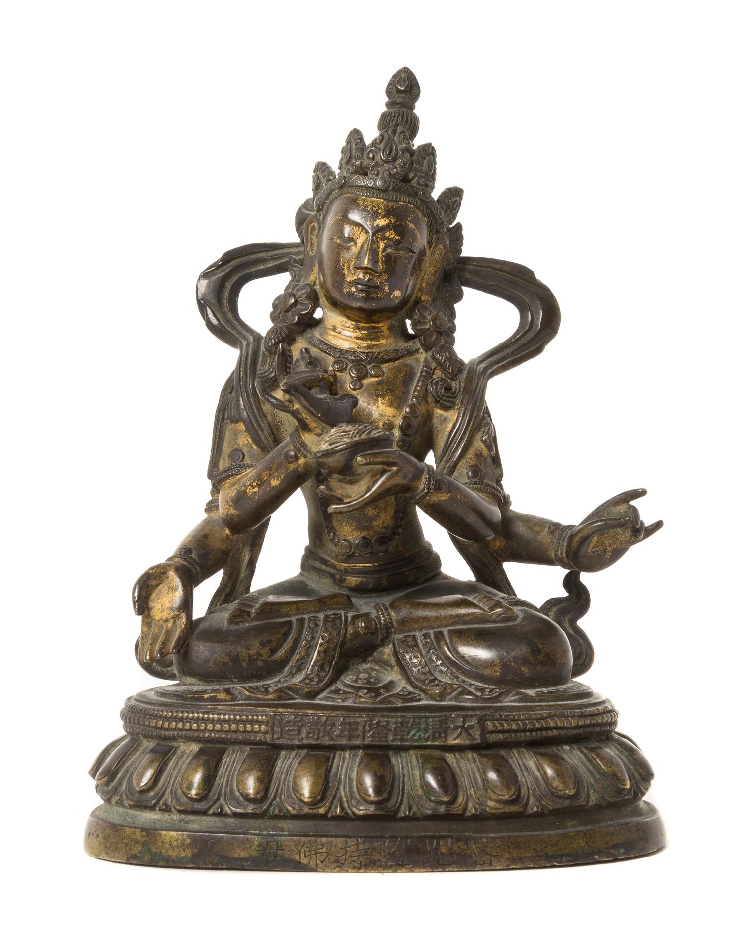 A Sino-Tibetan Parcel-Gilt Bronze Figure of Four-Armed Avalokiteshvara — QIANLONG PERIOD (1736-1795)
