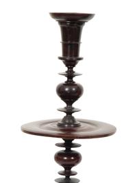 A Pair of Portuguese Colonial Jacaranda Candlesticks