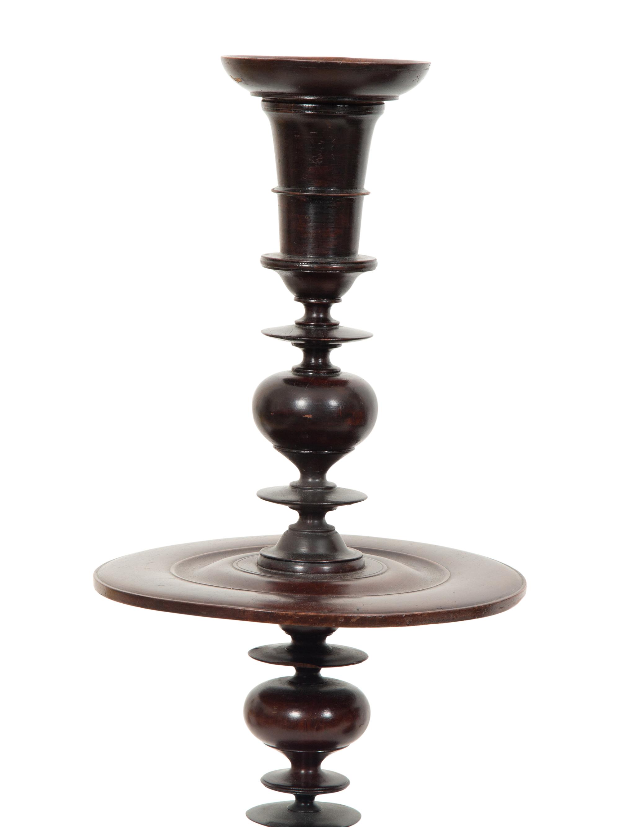 A Pair of Portuguese Colonial Jacaranda Candlesticks