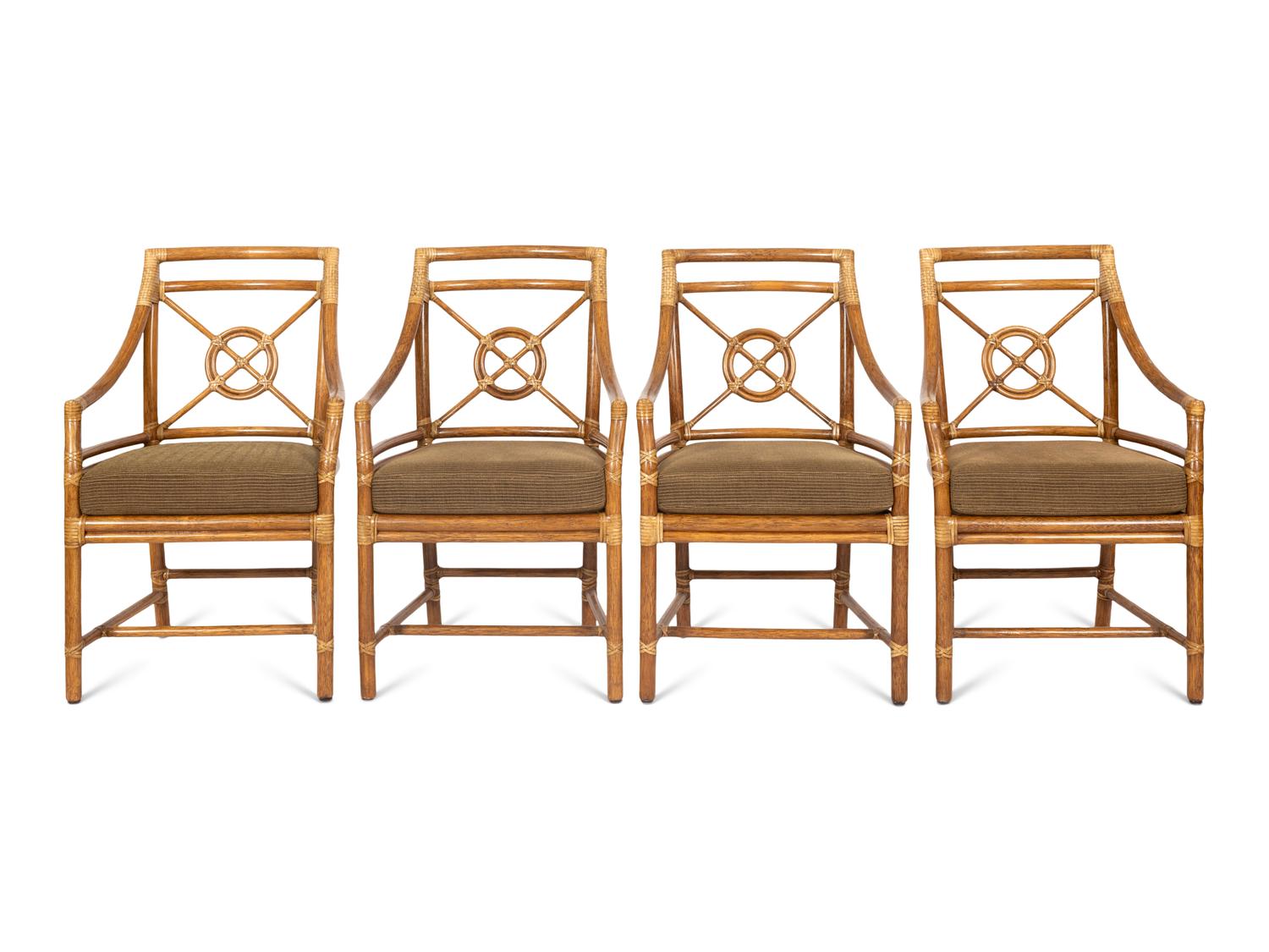 A Set of Four McGuire Rattan Target Armchairs and an Organic Bamboo Table