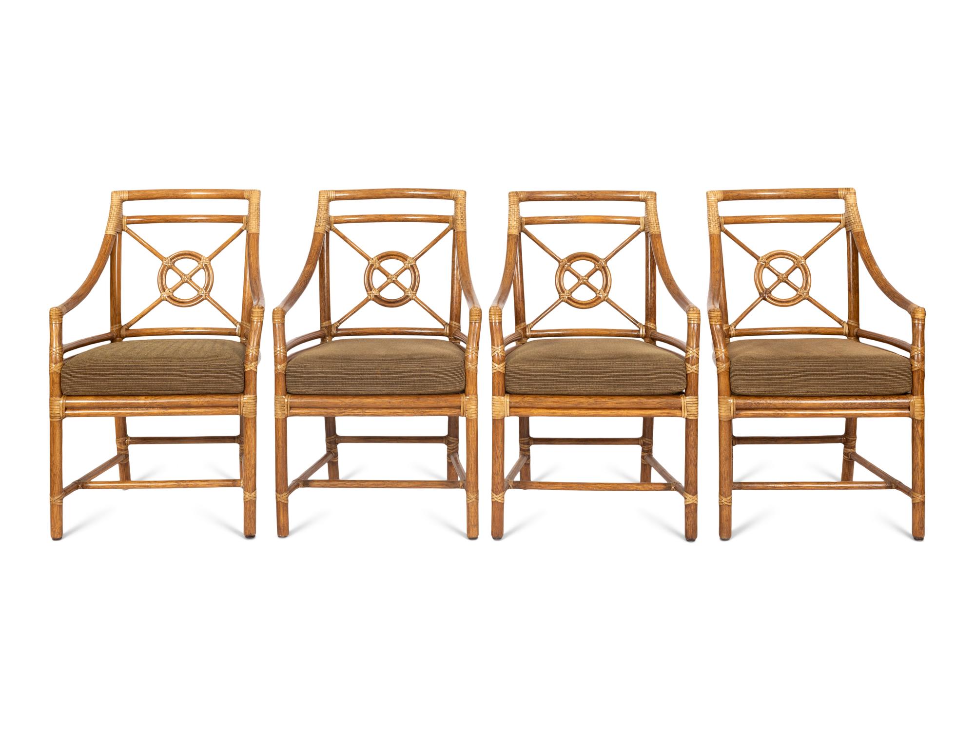 A Set of Four McGuire Rattan Target Armchairs and an Organic Bamboo Table