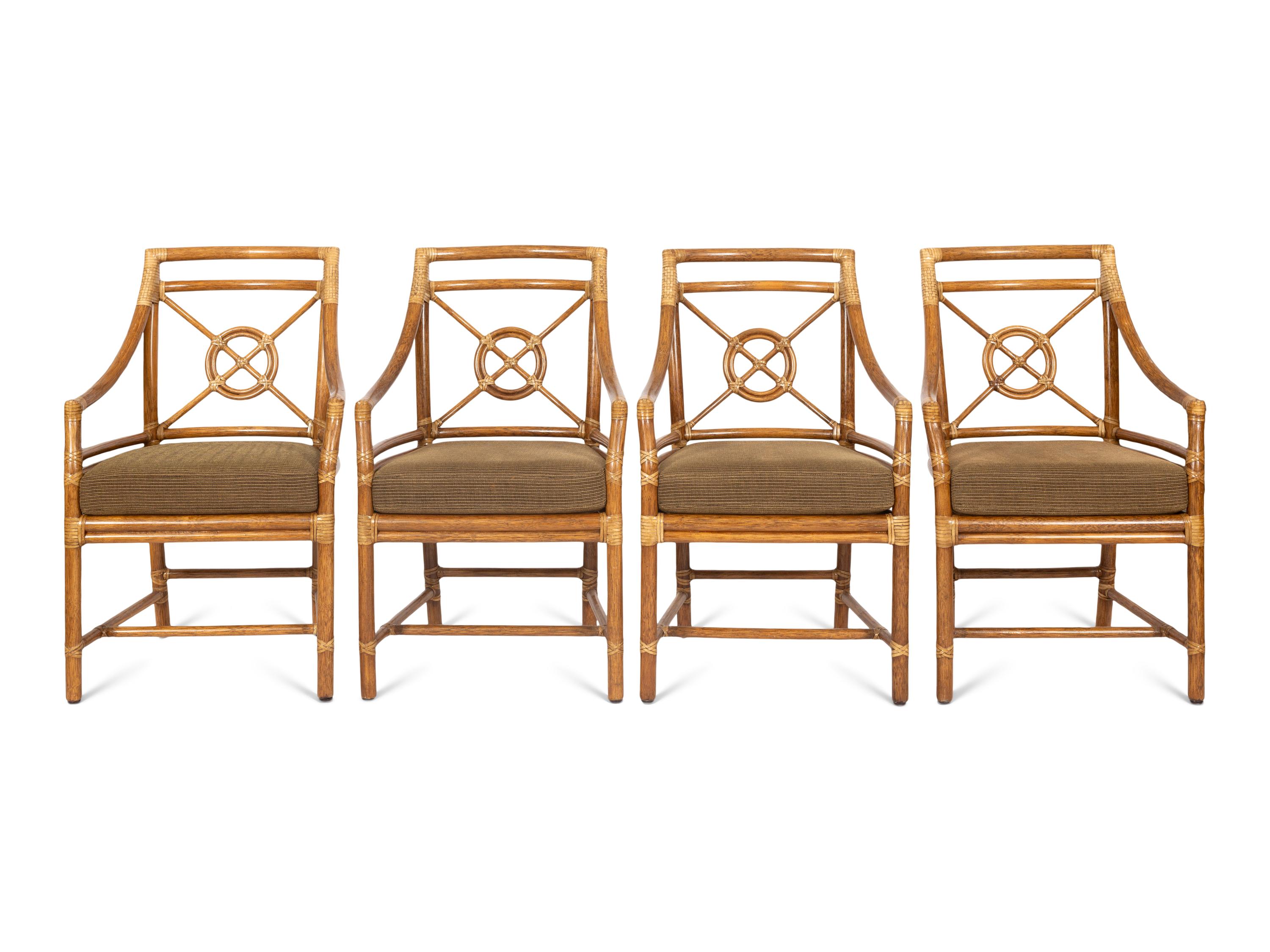 A Set of Four McGuire Rattan Target Armchairs and an Organic Bamboo Table
