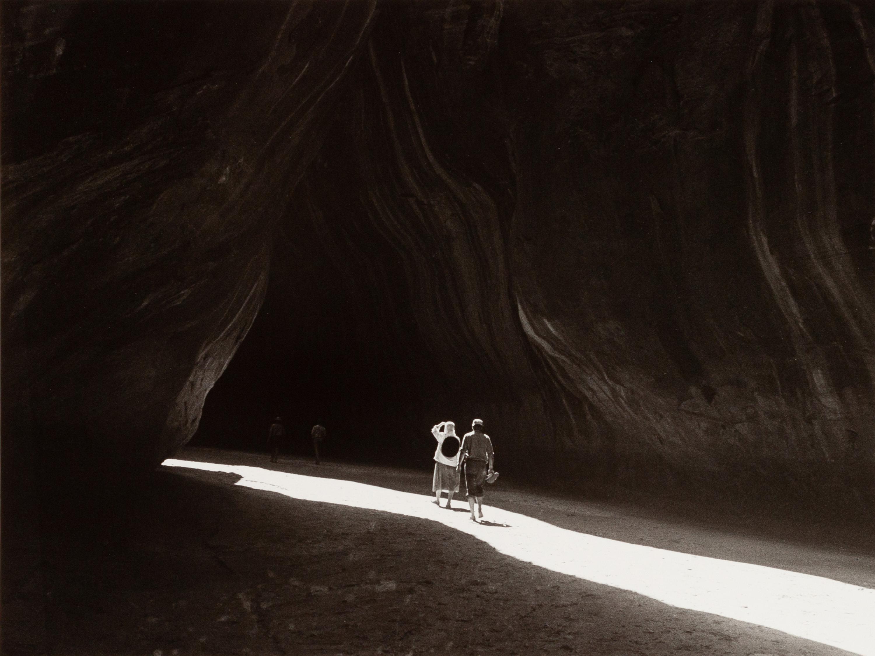 A group of four photographs ( O'Keeffe, Glen Canyon , 1961 (printed 1984); Georgia O'Keeffe Photographing the Chama River , 1961 (printed 1984); Untitled (O'Keeffe walking towards building) , 1960s; Untitled (O'Keeffe walking from building ), 1959 (printed 1984))