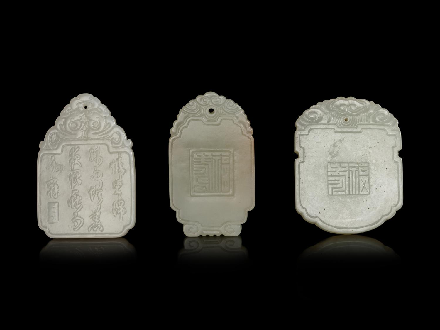 Three Chinese Pale Celadon Jade Plaques