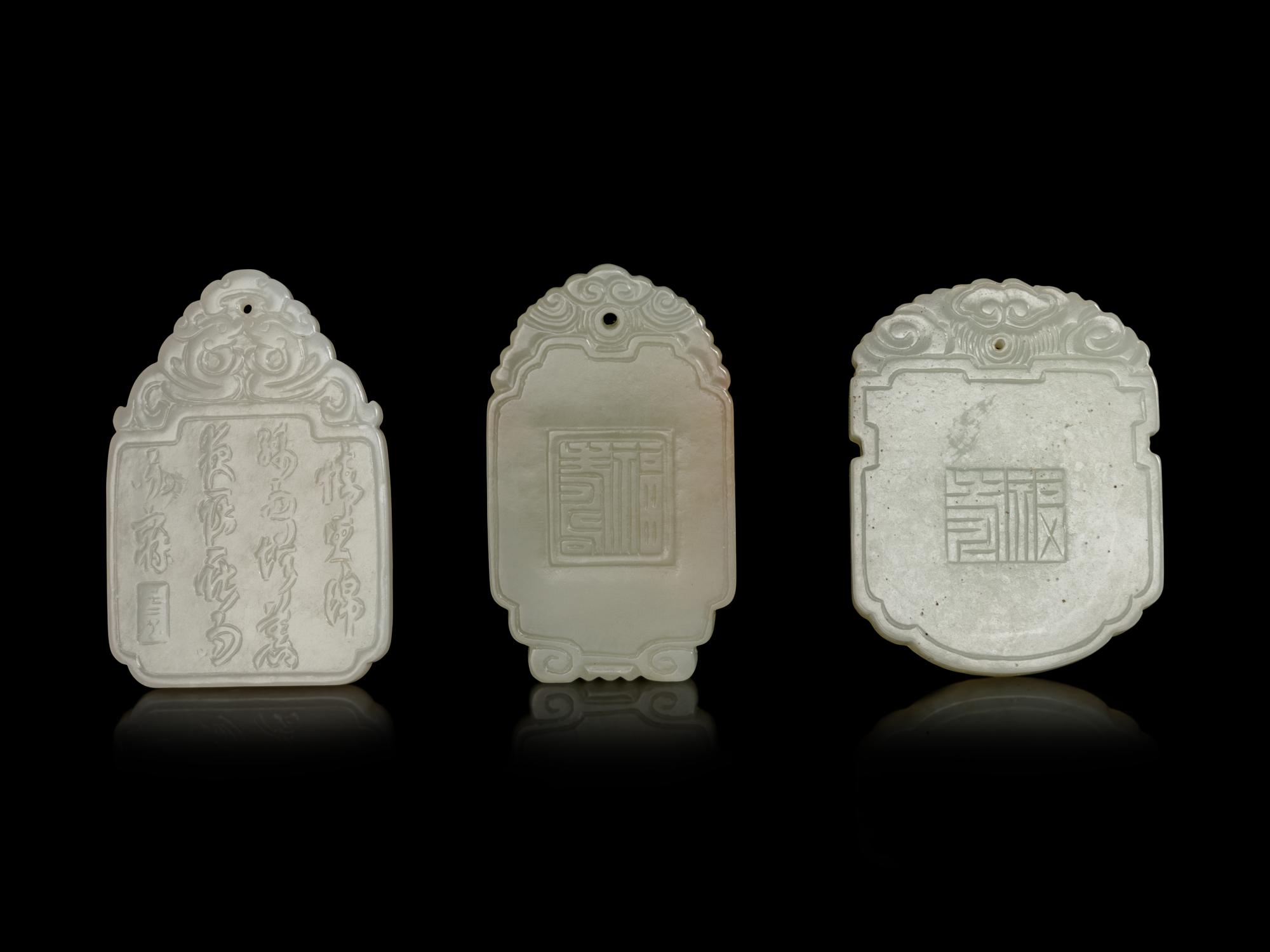 Three Chinese Pale Celadon Jade Plaques