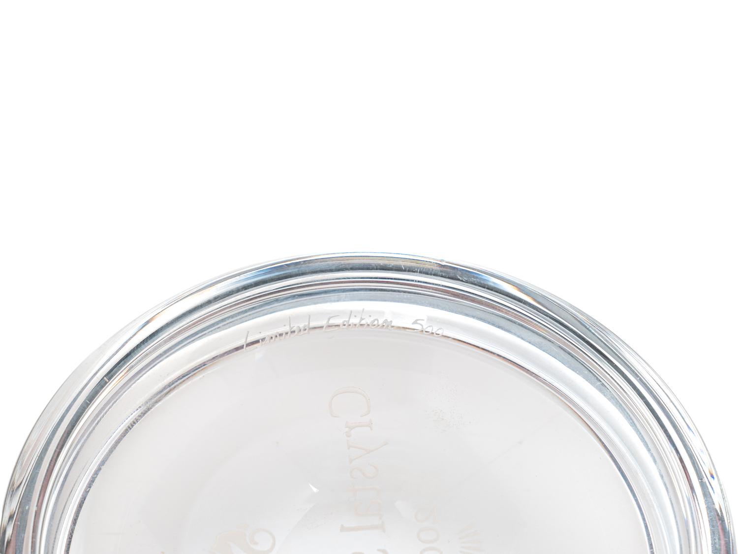 A Village Scene Diorama Faceted Glass Paperweight and a Commemorative Glass Paperweight