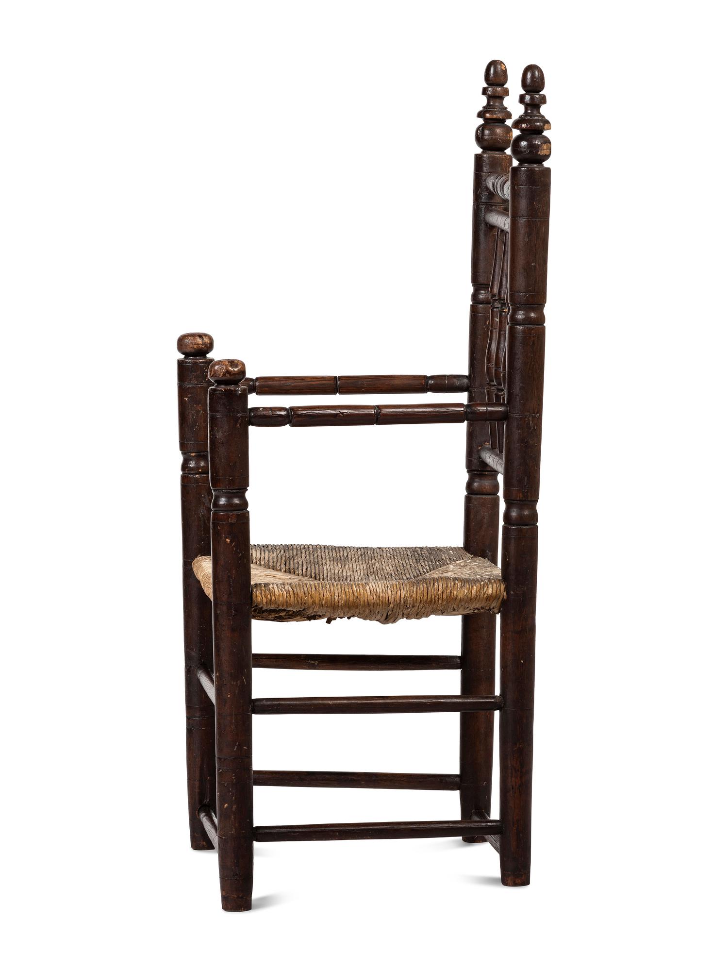 A Pilgrim Century Turned Maple and Oak Spindle-Back Rush-Seat Armchair