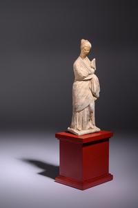 A Greek Terracotta Female with a Fan