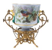 A French Gilt Bronze Mounted Porcelain Jardiniere, 19TH CENTURY, Height 12 3/4 x width over handles 13 1/2 inches. — 19TH CENTURY,
