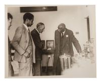 CARVER, George Washington (ca 1864-1943). Two TLsS ("G.W. Carver"), April and October 1936.[ With: ] POLK, Prentice H. (1898-1984), photographer. Photograph of George Washington Carver and Henry Ford, signed ("P.H. Polk"), ca 1920s.