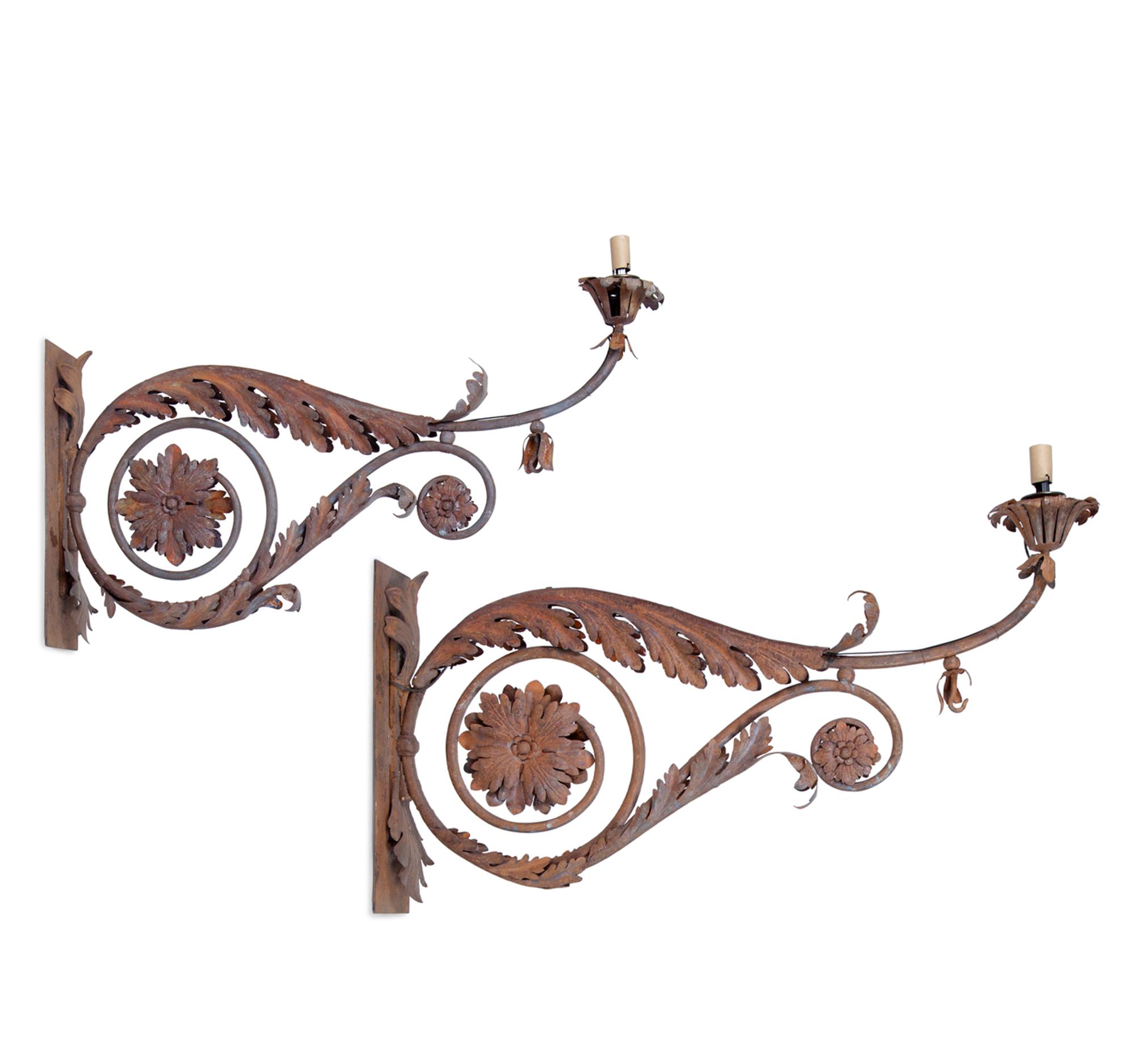 A Pair of Continental Wrought Iron and Tole Sconces