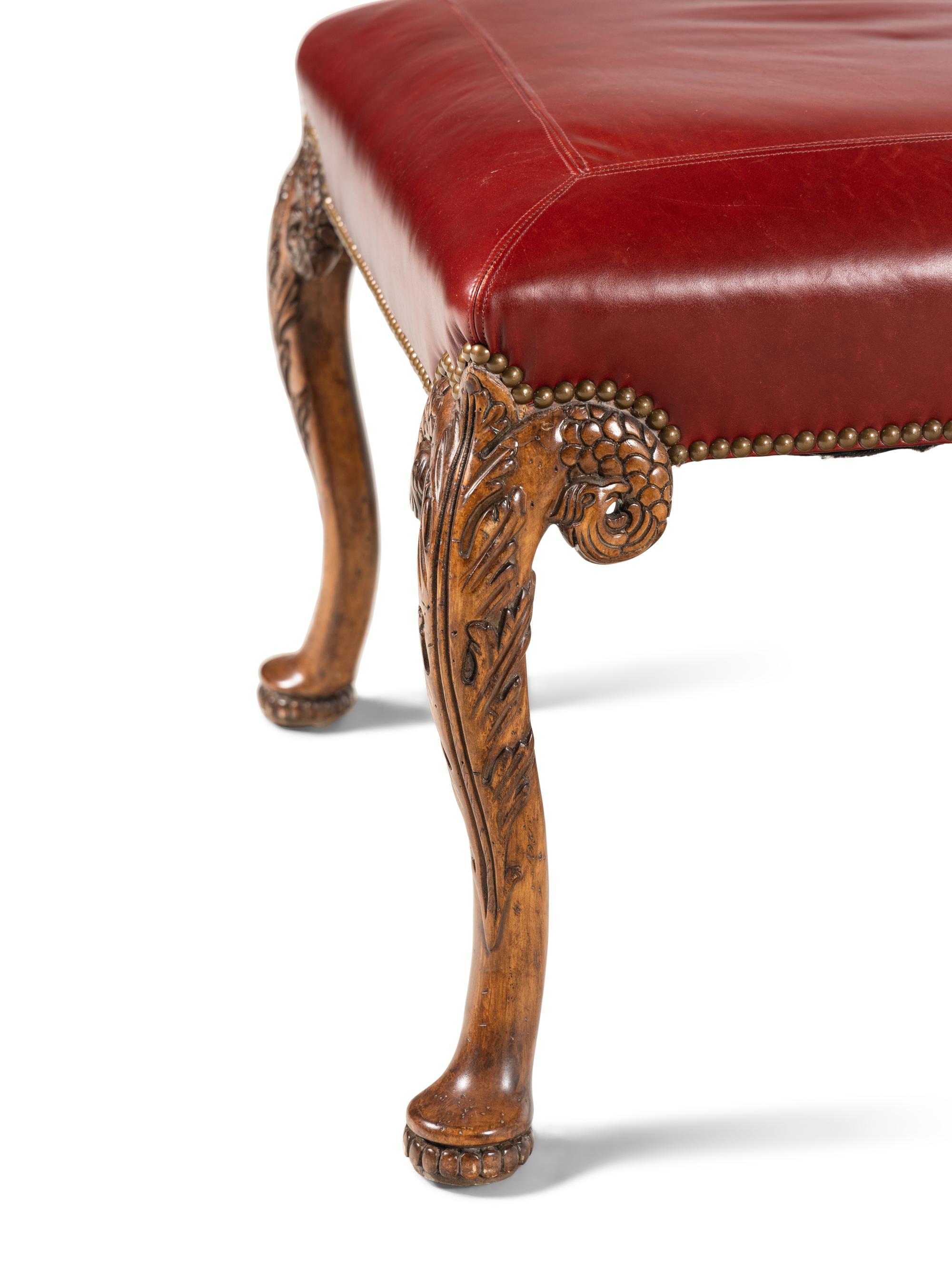 A Pair of George II Style Carved Walnut Stools