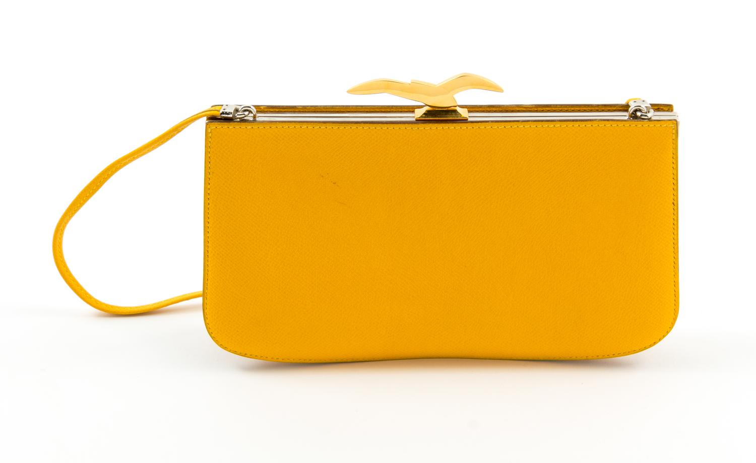 An Hermès Yellow Sac à Malice Bag, 9" x 5.5" x 2"; Strap drop: 17".