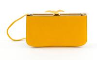 An Hermès Yellow Sac à Malice Bag, 9" x 5.5" x 2"; Strap drop: 17".