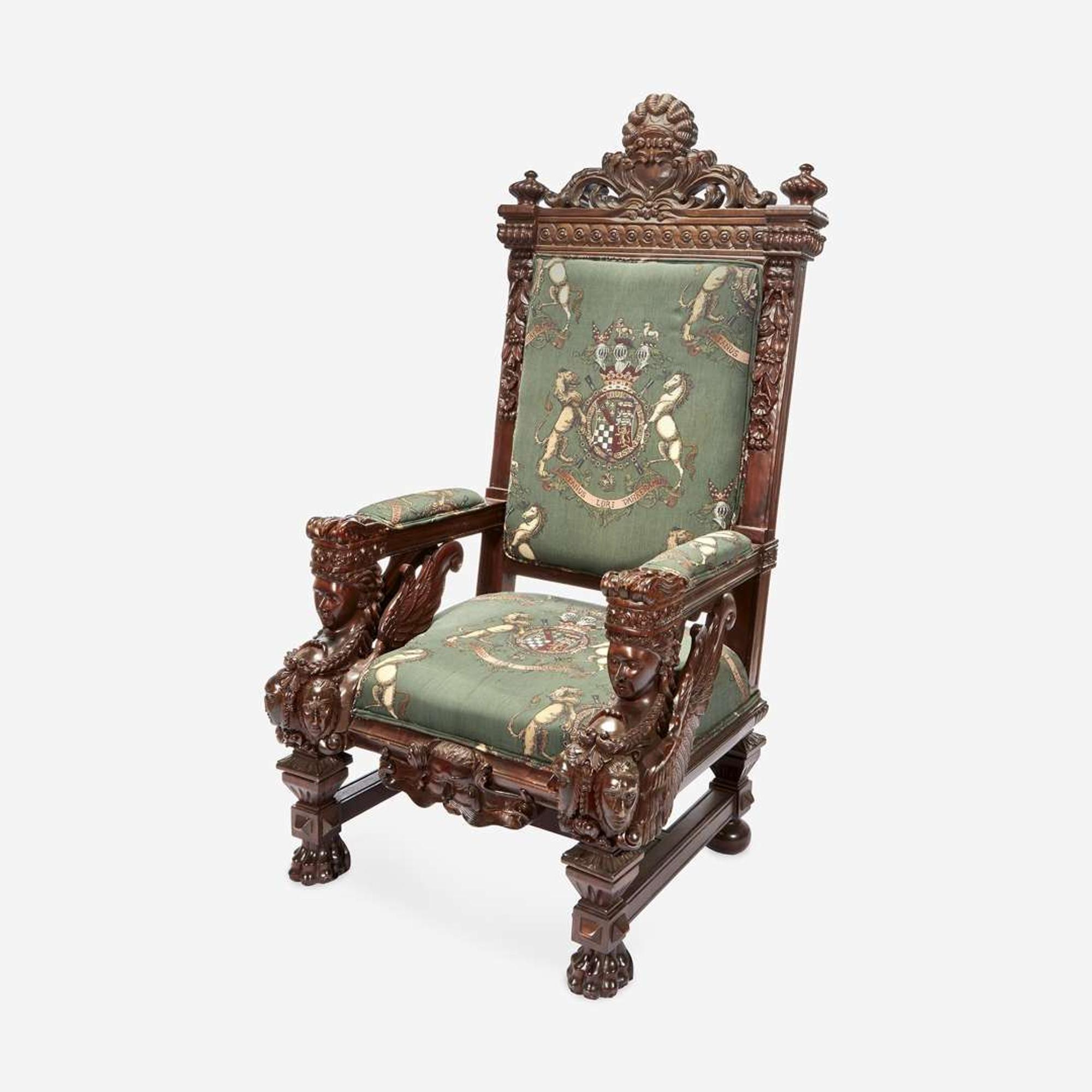 A Large Carved Renaissance Revival Throne Chair Upholstered in Armorial Fabric