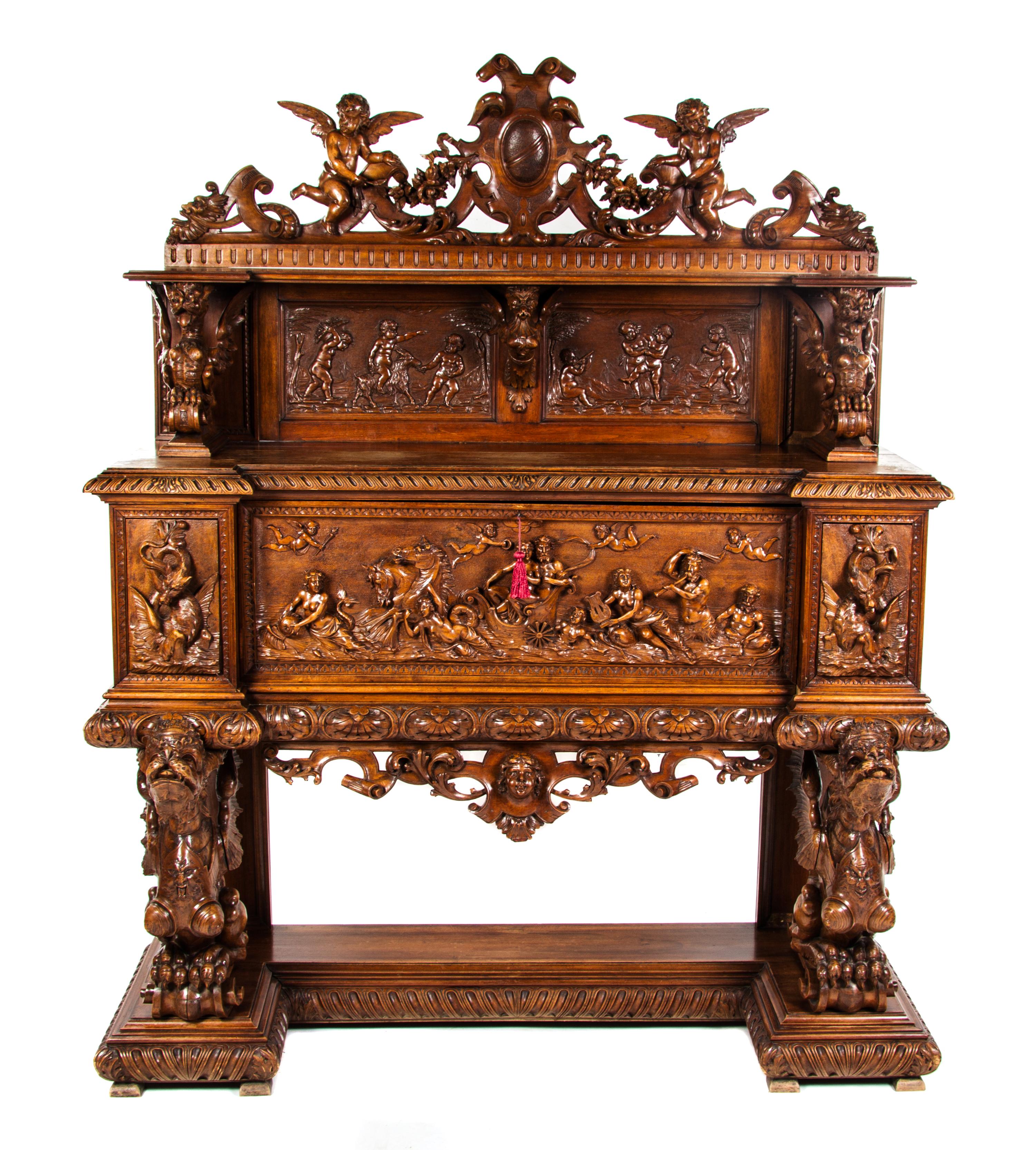 A Renaissance Revival Carved Oak Console Cabinet, ATTRIBUTED TO R.J. HORNER, Height 77 x width 62 x depth 26 inches. — ATTRIBUTED TO R.J. HORNER,