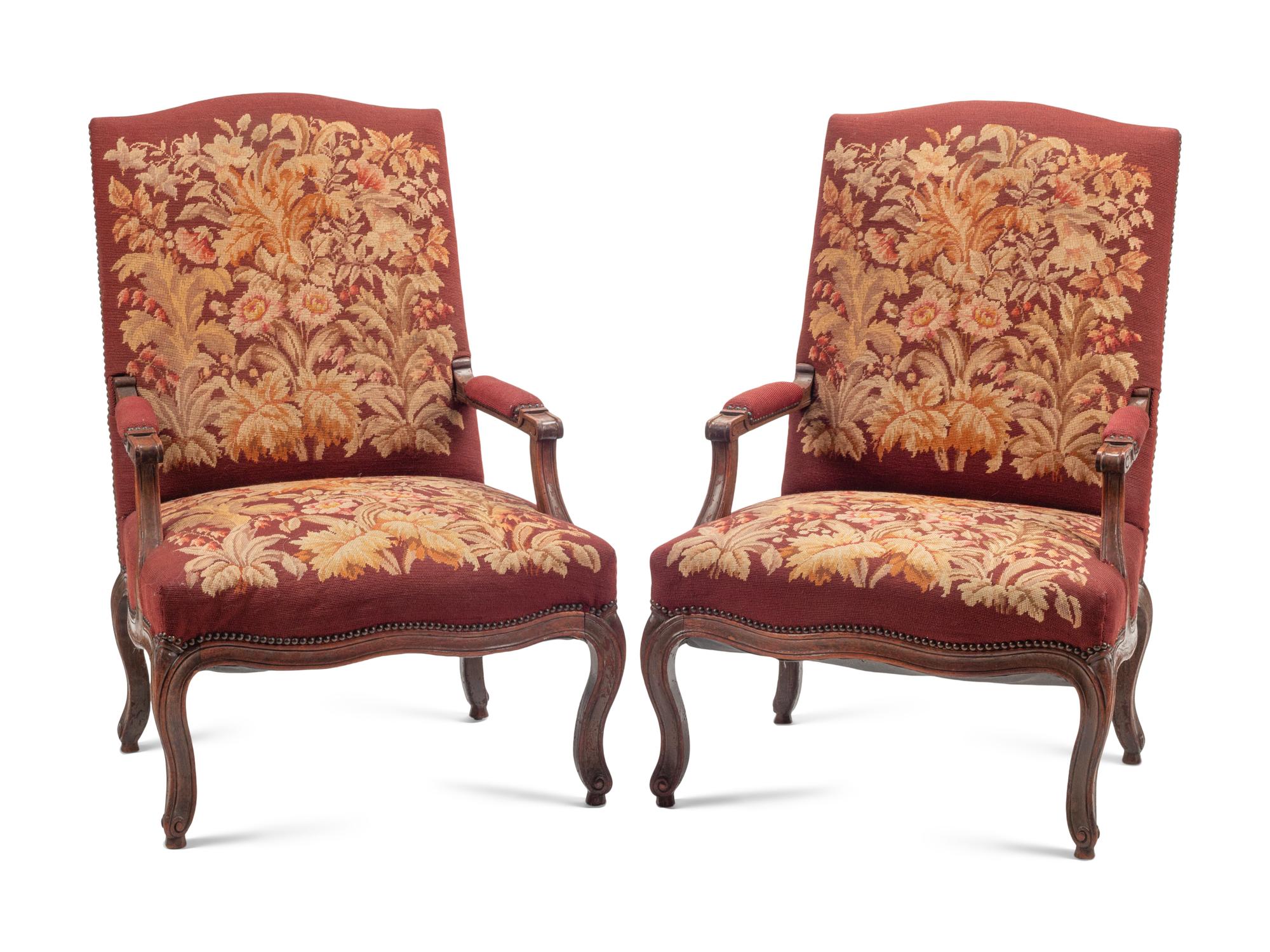 A Pair of Louis XV Walnut Fauteuils