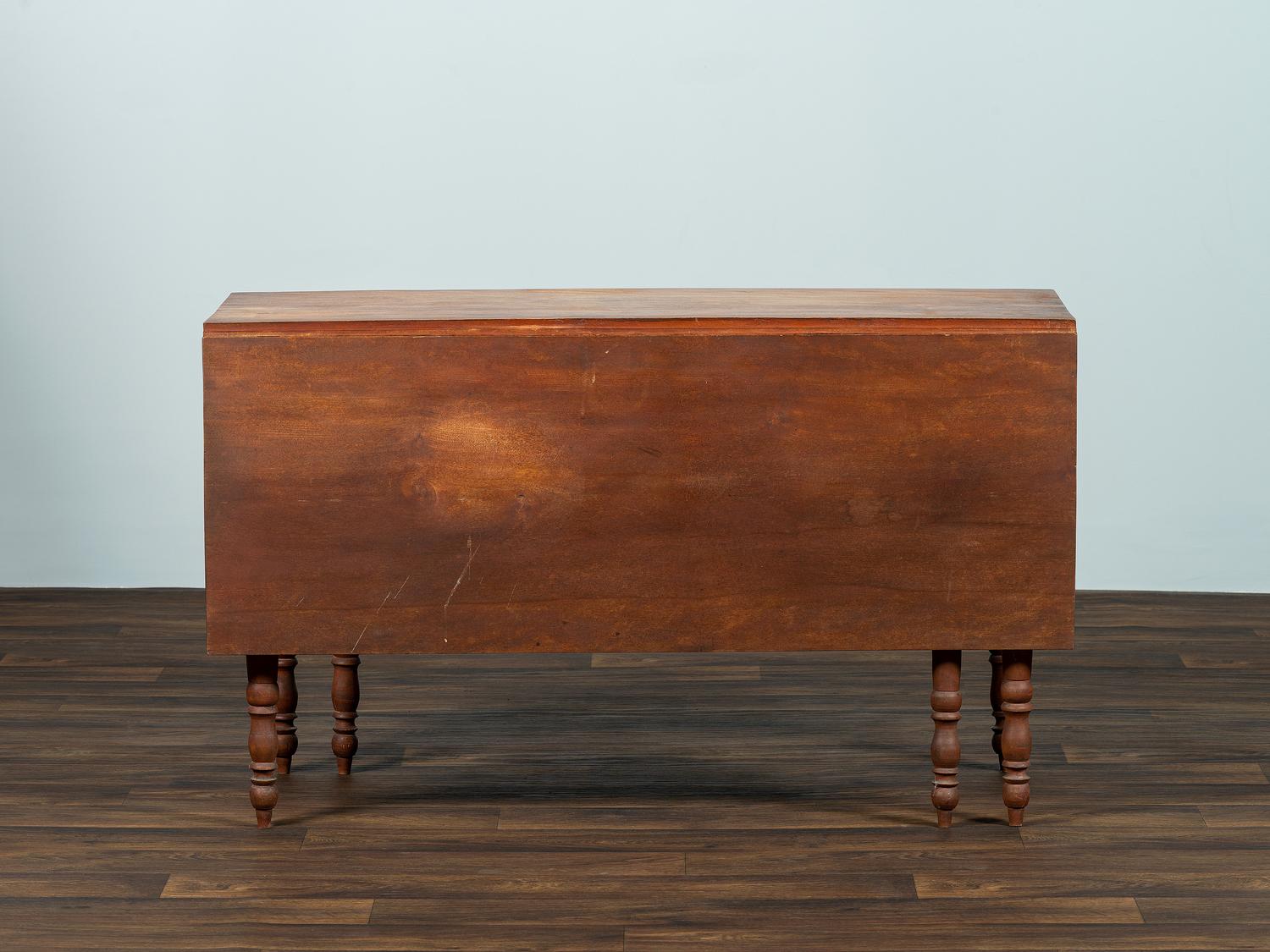 A Late Federal Cherrywood Drop-Leaf Dining Table