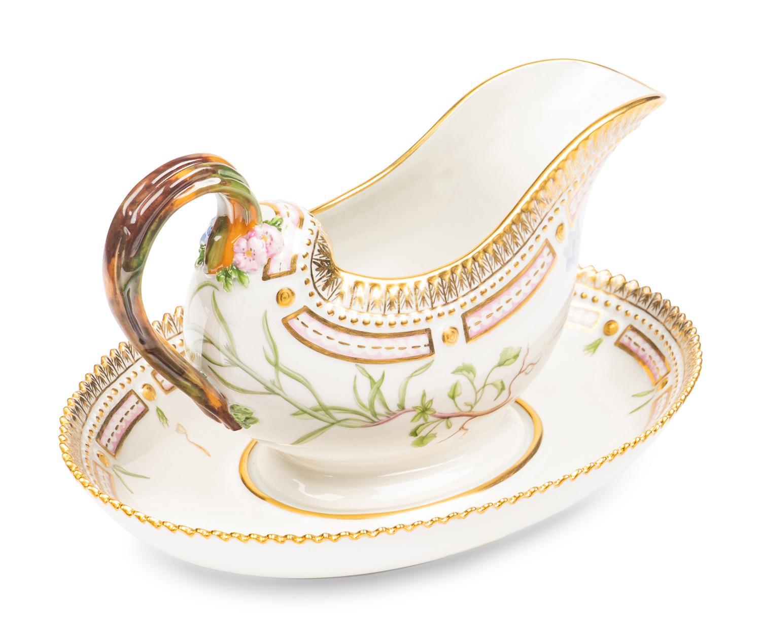A Royal Copenhagen Flora Danica Porcelain Sauce Boat and Fixed Stand