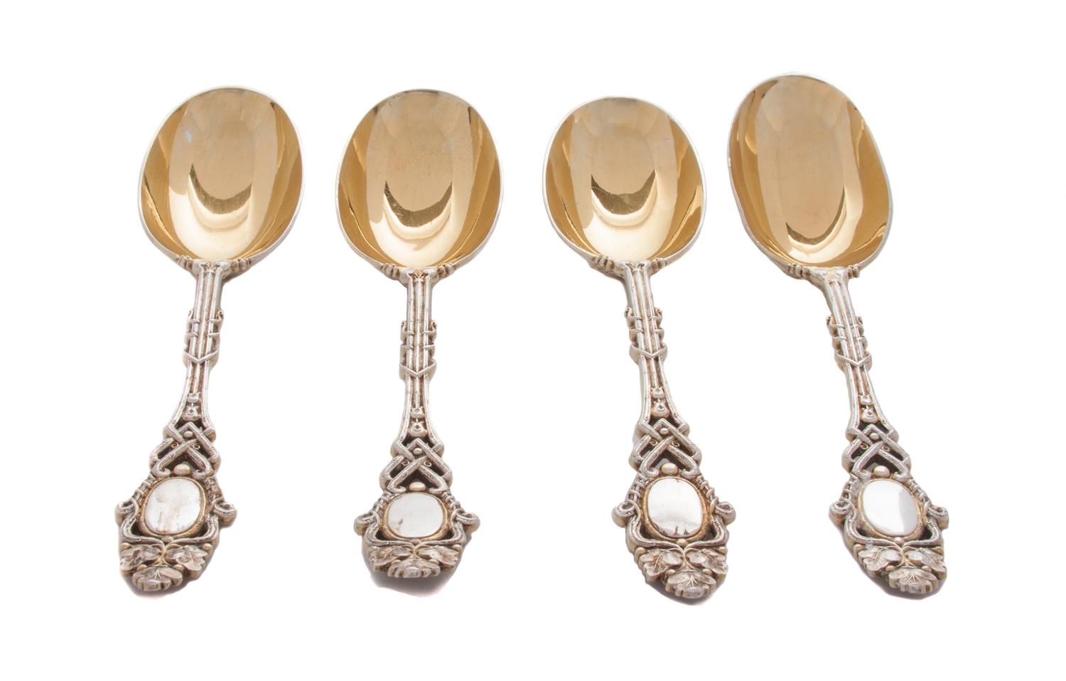 A Set of Four Victorian Silver-Plate Spoons, Elkington & Co., Mid-19th Century, having entwined geometric form handles bordering vacant