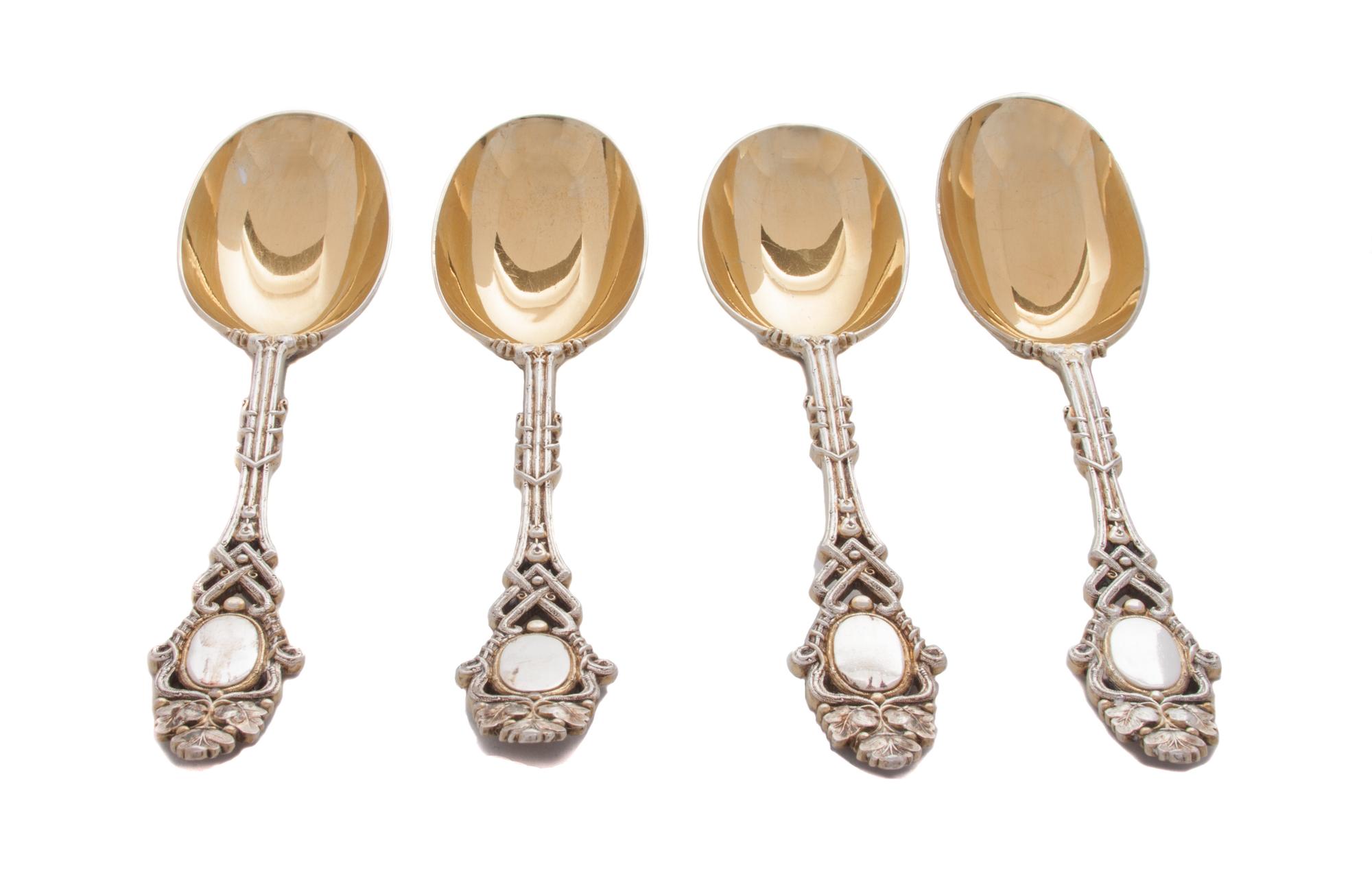 A Set of Four Victorian Silver-Plate Spoons, Elkington & Co., Mid-19th Century, having entwined geometric form handles bordering vacant