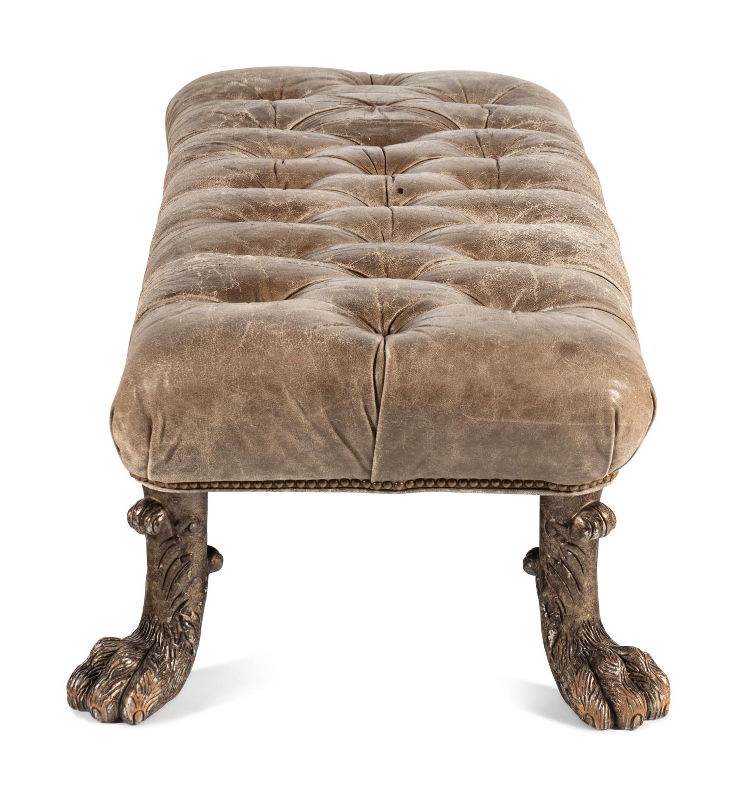 A Leather Upholstered Ottoman