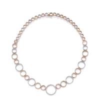 An 18 Karat Tricolor Gold and Diamond 'Circle of Life' Necklace, Roberto Coin,