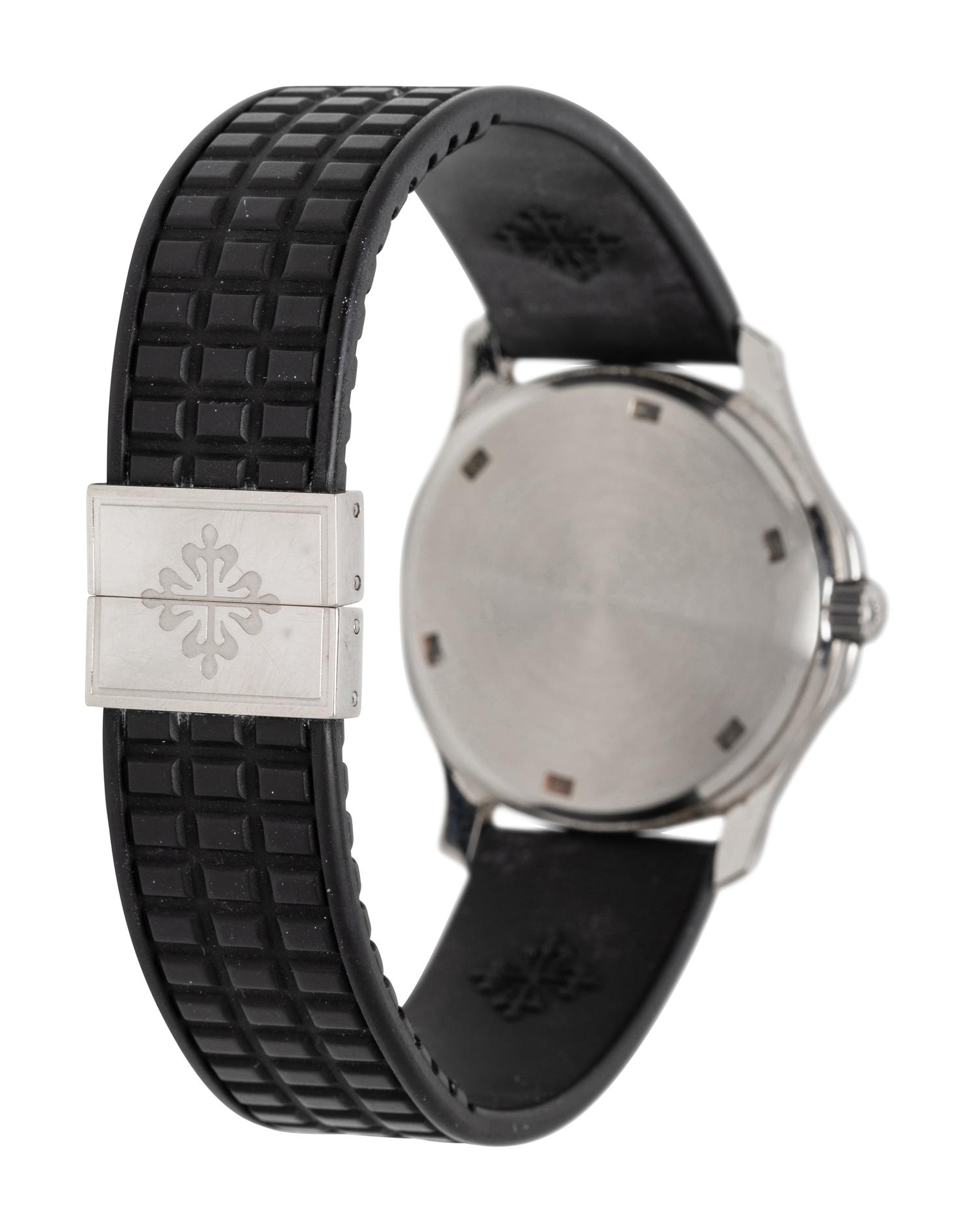 PATEK PHILIPPE, REF. 5060A-001 STAINLESS STEEL 'AQUANAUT' WATCH, RETAILED BY TIFFANY & CO., BOX & PAPERS