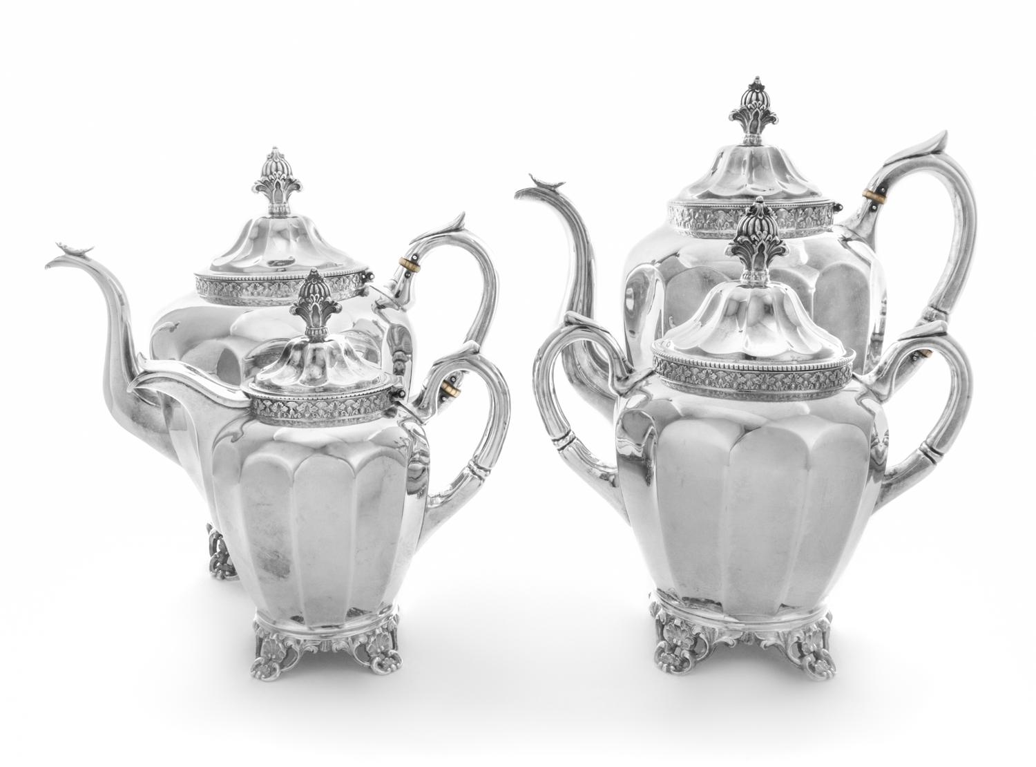 An American Coin Silver Four-Piece Tea and Coffee Service, Wood & Hughes, New York, NY, 19th Century, comprising a teapot, coffee pot,