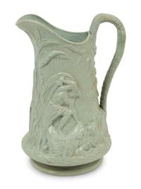 A Collection of Eight English Salt Glazed Relief Form Pitchers and Molded Earthenware — 19TH CENTURY