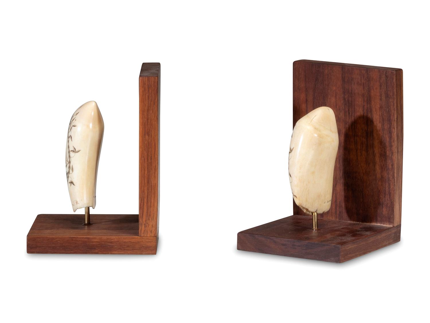 A Pair of Robert Spring Scrimshaw Whale's Teeth