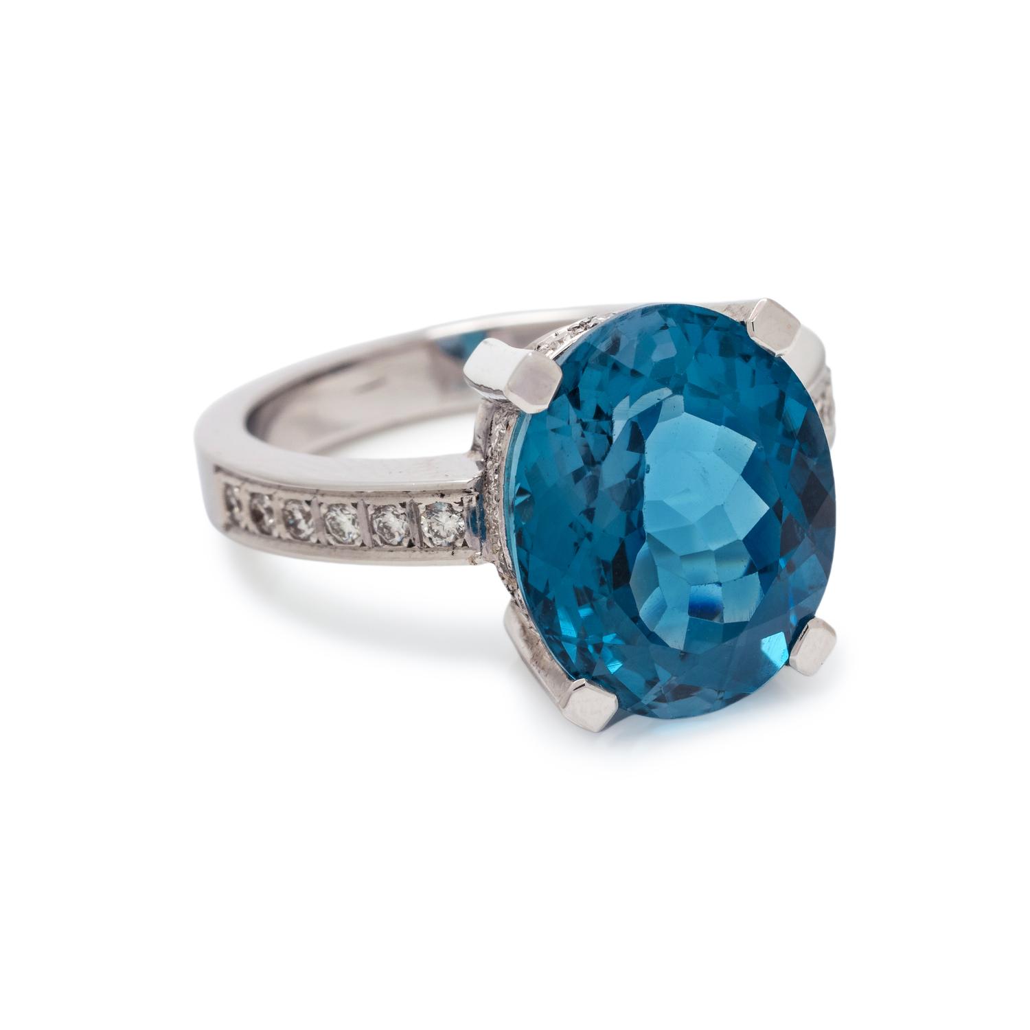 BLUE TOPAZ AND DIAMOND RING