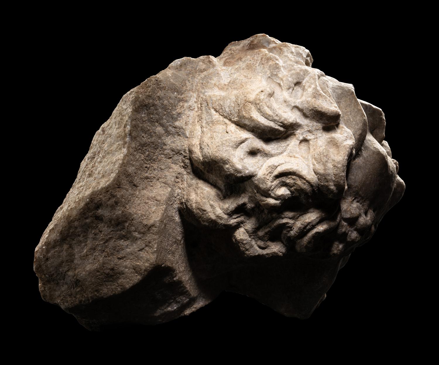 A Roman Marble Head of a Man in Relief