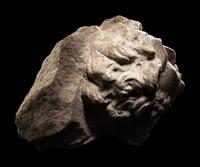 A Roman Marble Head of a Man in Relief