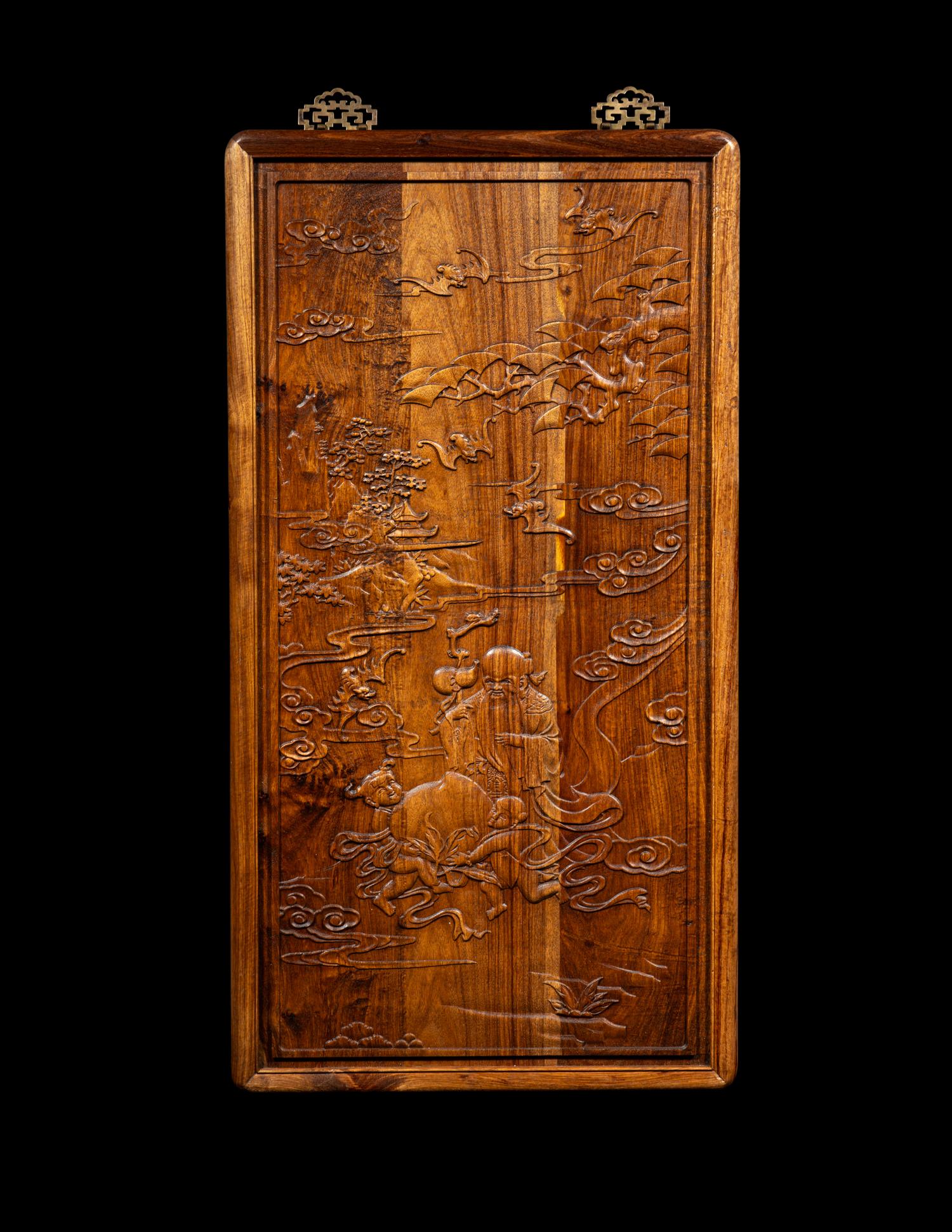 A Set of Three Chinese Huanghuali Couplet Wall Panels