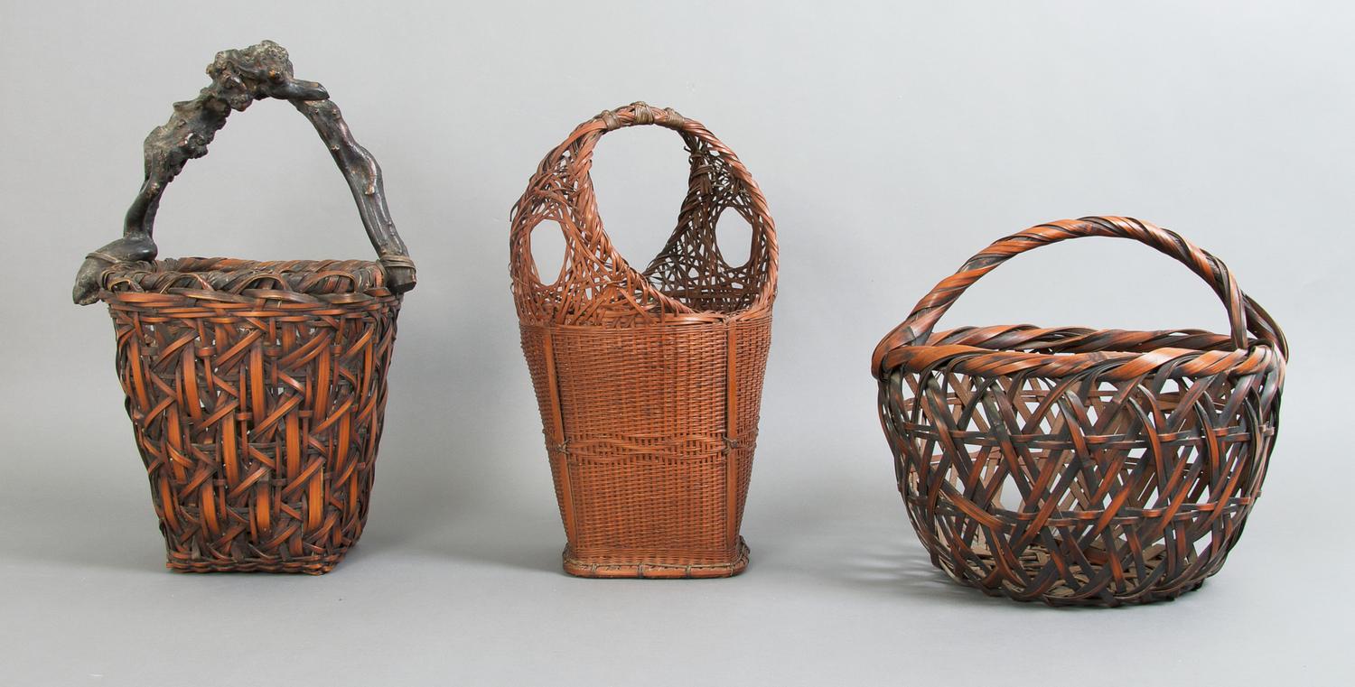 A Group of Three Japanese Bamboo Baskets, Height of tallest 16 inches.