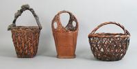 A Group of Three Japanese Bamboo Baskets, Height of tallest 16 inches.