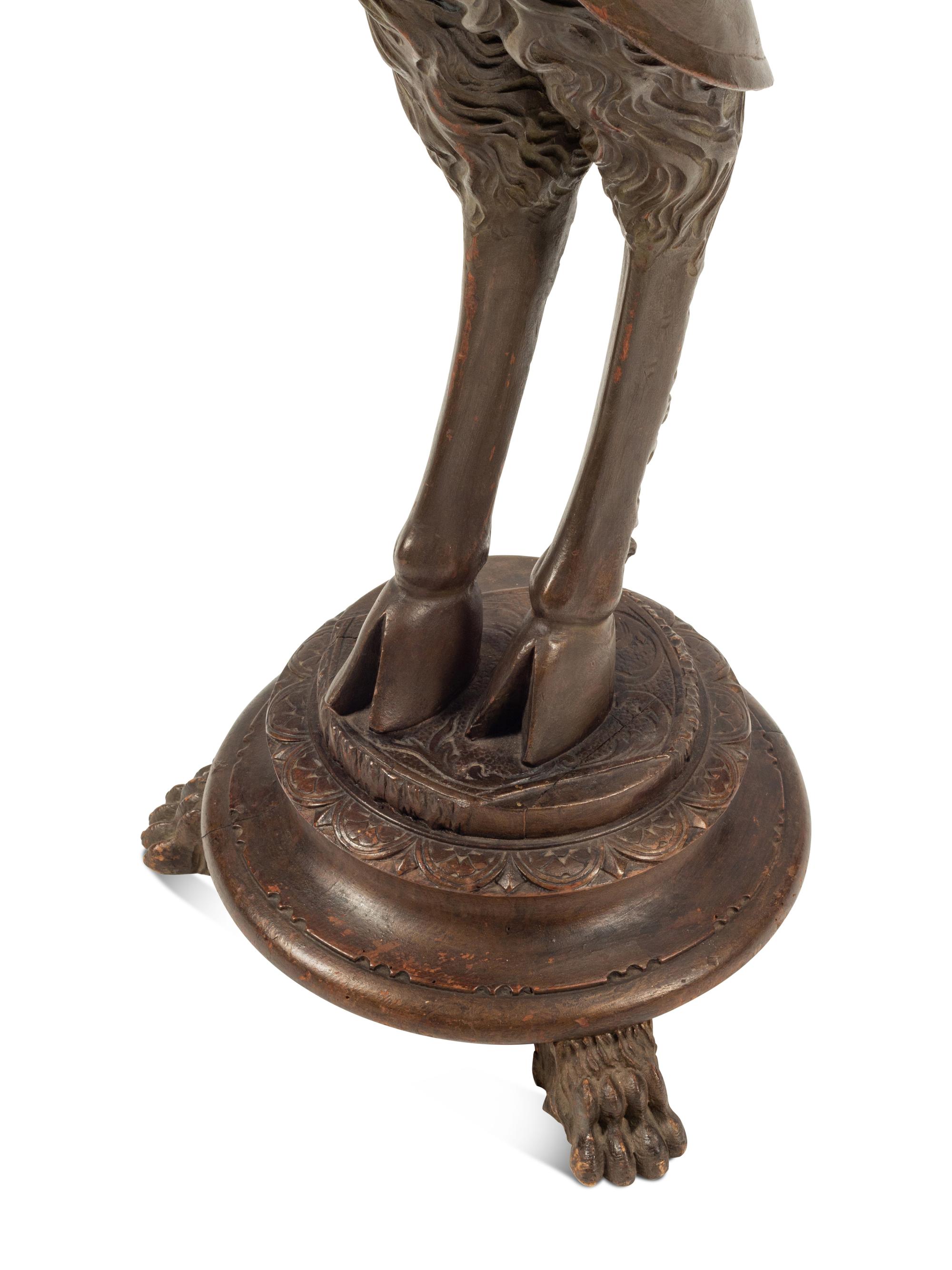 A Venetian Carved Walnut Figural Stand