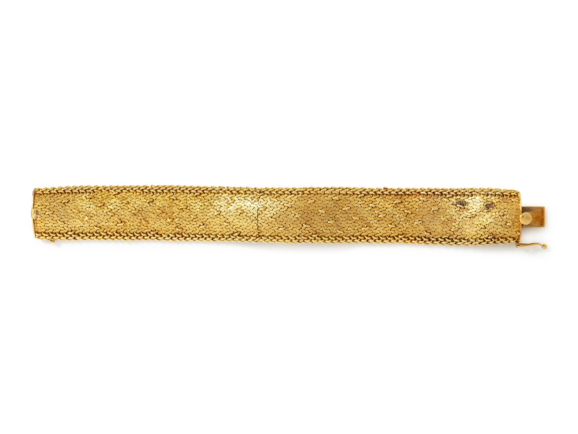 A 14 Karat Yellow Gold Surprise Wristwatch, Jean Claude,