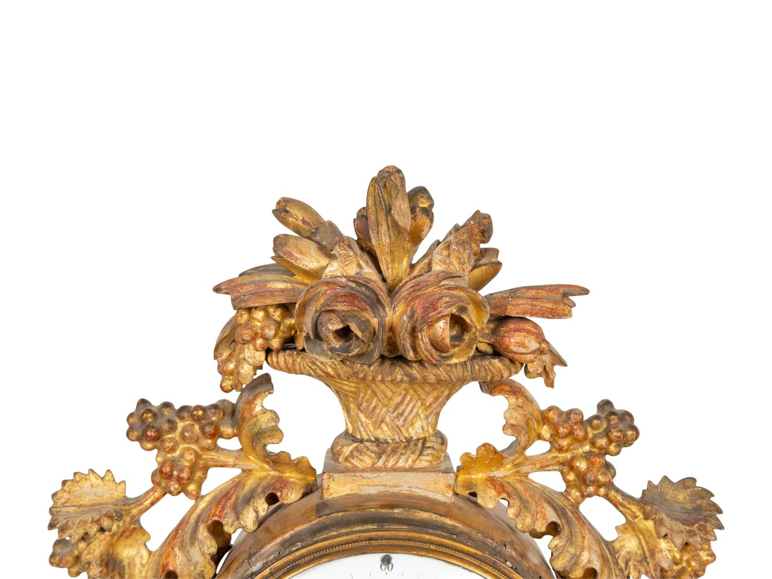 An Austrian Carved Giltwood Mantel Clock